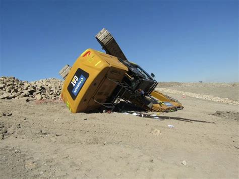 tip over excavator recovery